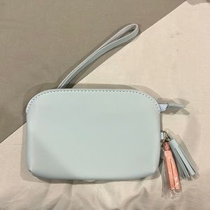 Blue pastel wristlet with blue and pink tassel